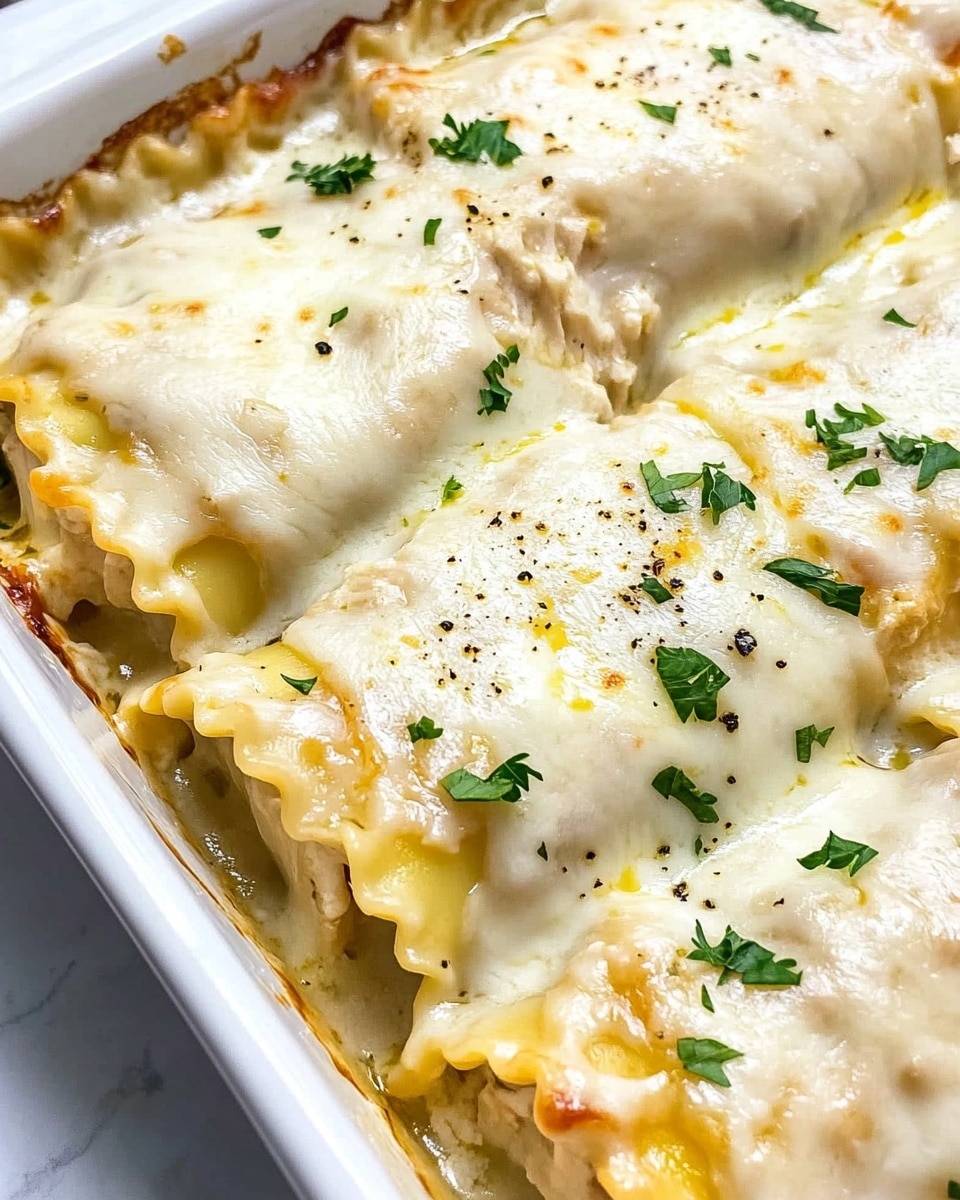 Chicken Alfredo Lasagna Rolls, creamy lasagna roll ups, easy chicken lasagna recipe, cheesy Alfredo stuffed pasta, comforting baked lasagna rolls