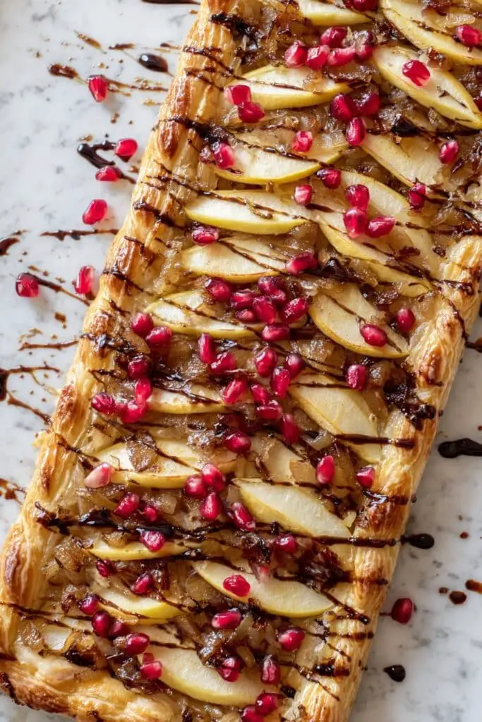 Apple Brie & Caramelized Onion Tart with Pomegranate Arils and Pomegranate Molasses Recipe