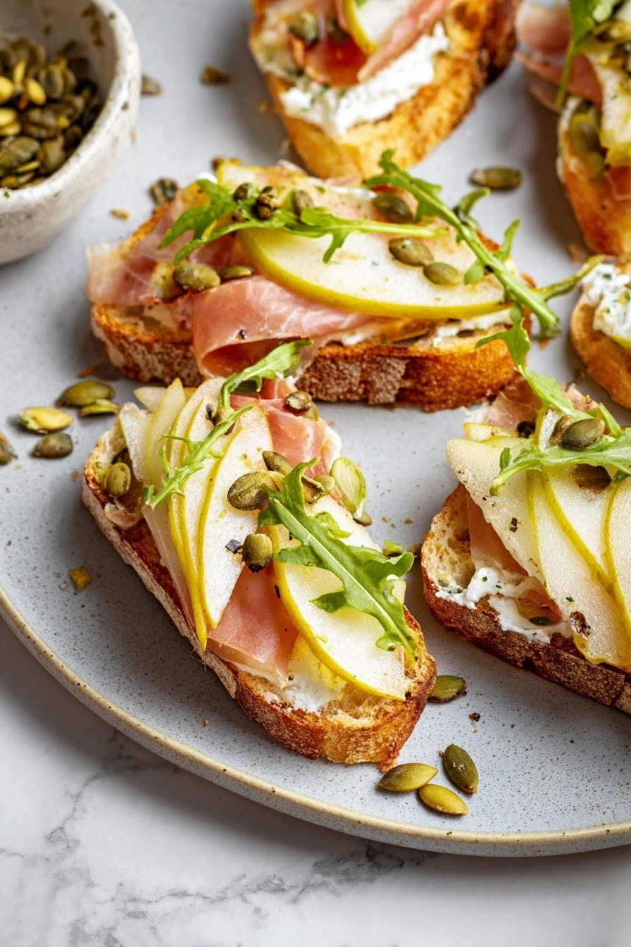 Ricotta and Pear Crostini with Salty Pumpkin Seed Pistachio Crunch Recipe - Serving