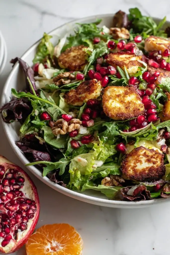 Pomegranate Greens Salad with Halloumi Croutons and Spiced Orange Vinaigrette Recipe