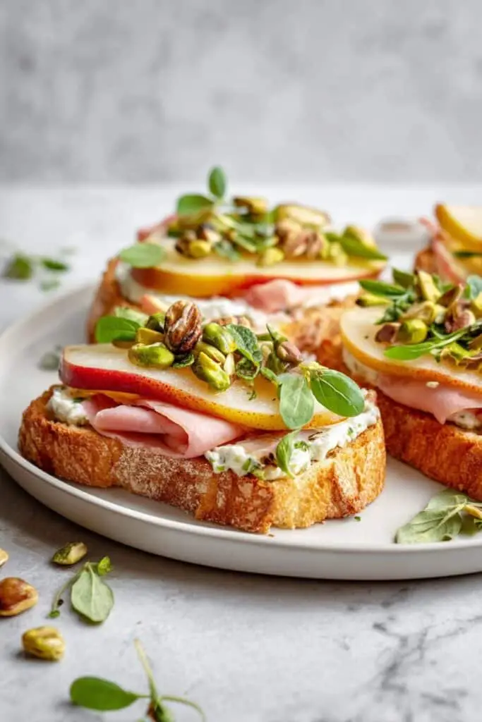 Ricotta and Pear Crostini with Salty Pumpkin Seed Pistachio Crunch Recipe