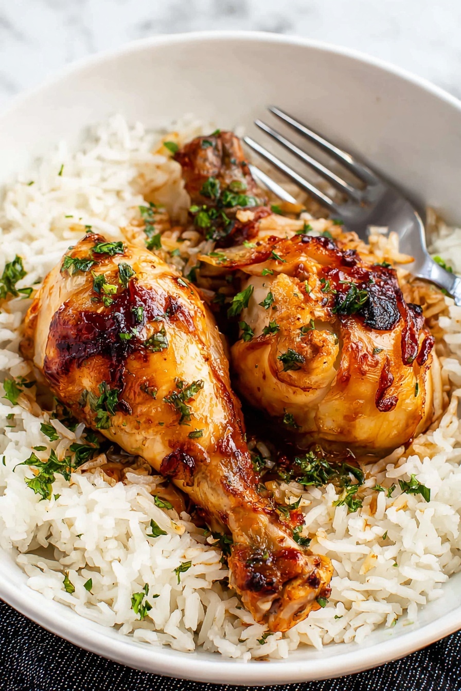 The image shows a baking pan full of golden brown chicken drumsticks with a shiny, slightly crispy skin. Each drumstick is covered with small bits of cooked garlic and sprinkled with chopped green herbs, most likely parsley, adding a fresh touch. The drumsticks are arranged close together, resting in a small pool of dark brown, rich sauce at the bottom of the white marbled surface pan, which looks moist and flavorful. The lighting highlights the drumsticks' glossy texture and slight charring on some edges, making them look very tasty. Photo taken with an iphone --ar 2:3 --v 7 - Honey Soy Chicken Drumsticks, easy chicken dinner, flavorful chicken recipes, baked chicken drumsticks, quick family-friendly dinners